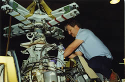 Mechanic working on helicopter